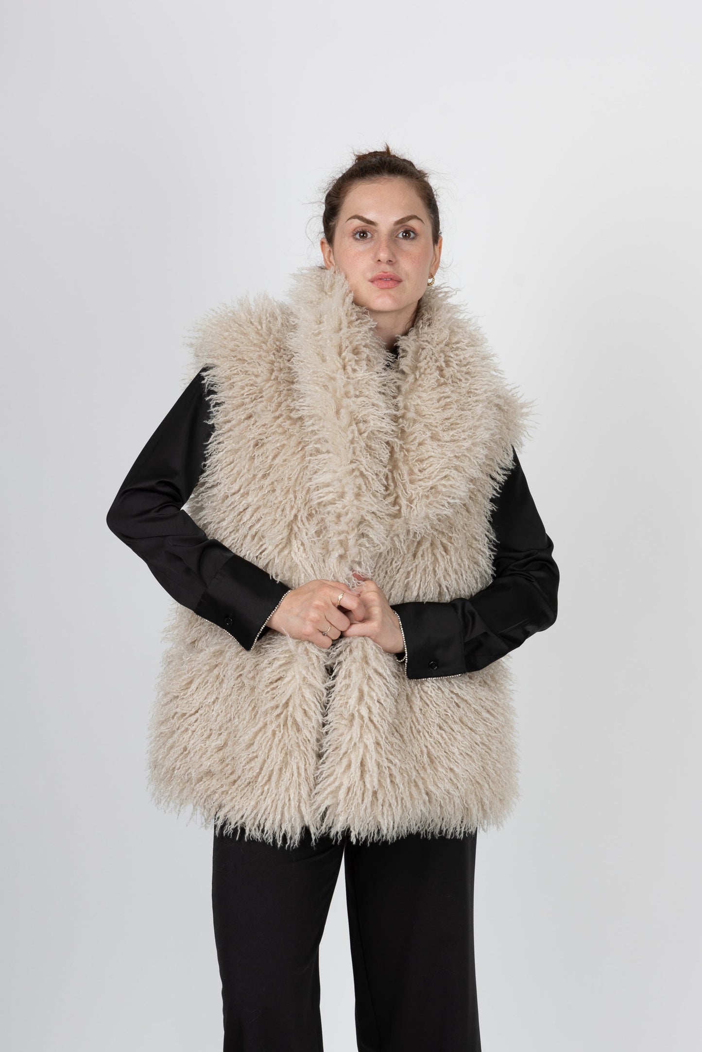 GILET SANS MANCHES EN FAUSSE FOURRURE MOUTON