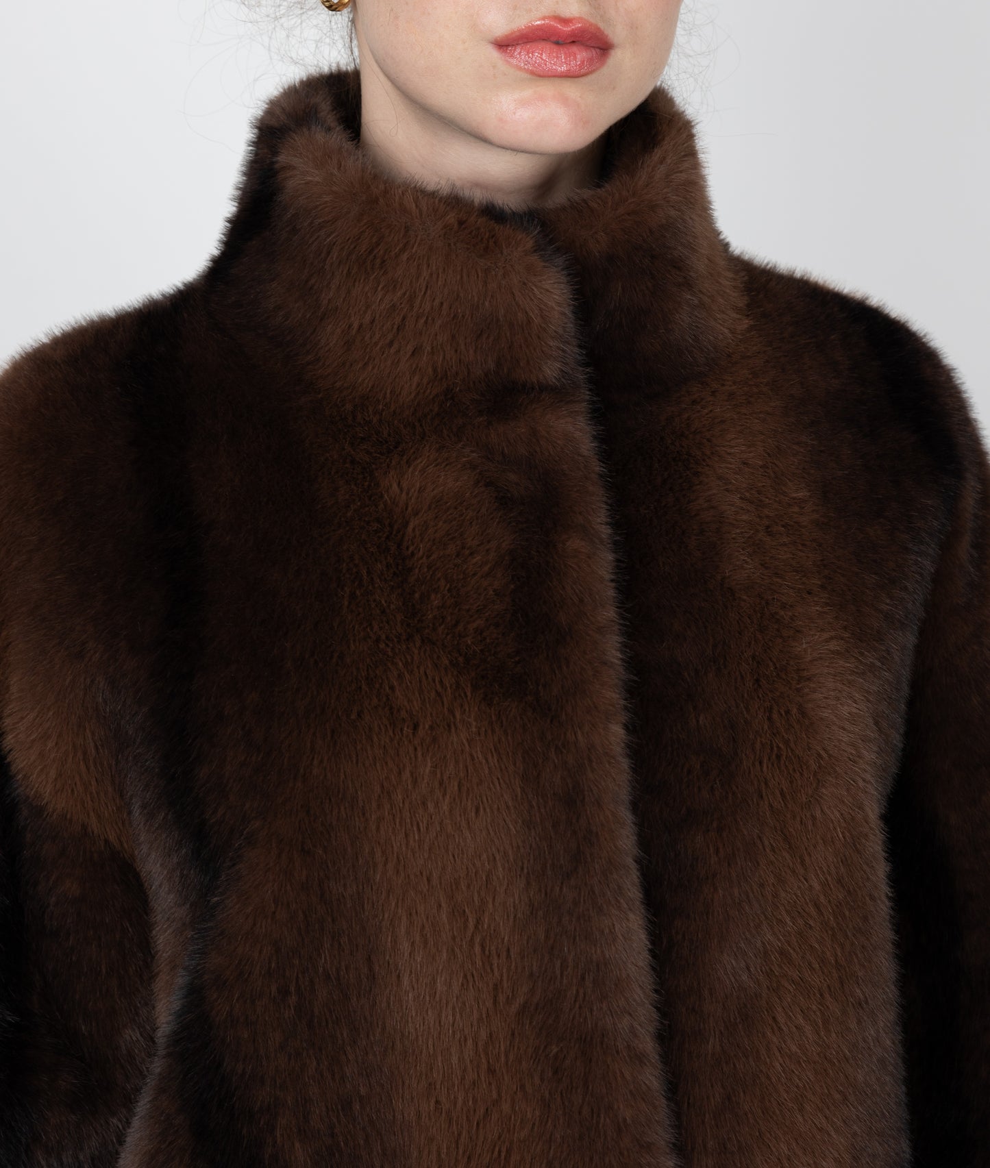 MANTEAU LONG EN FAUSSE FOURRURE À RAYURES