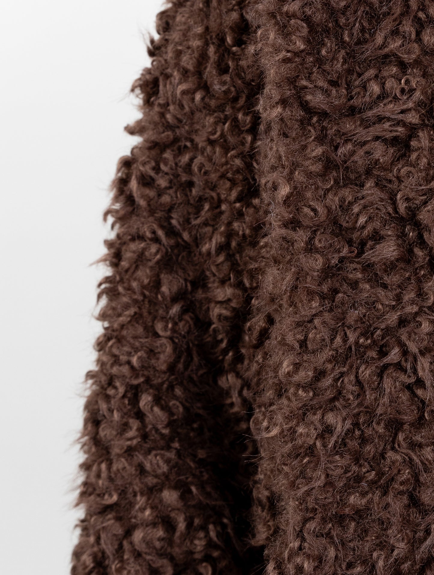 MANTEAU COURT EN FAUSSE FOURRURE MOUTON