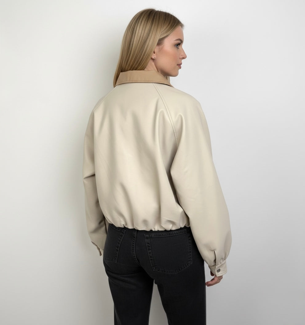 VESTE EN SIMILICUIR À COL CONTRASTÉ