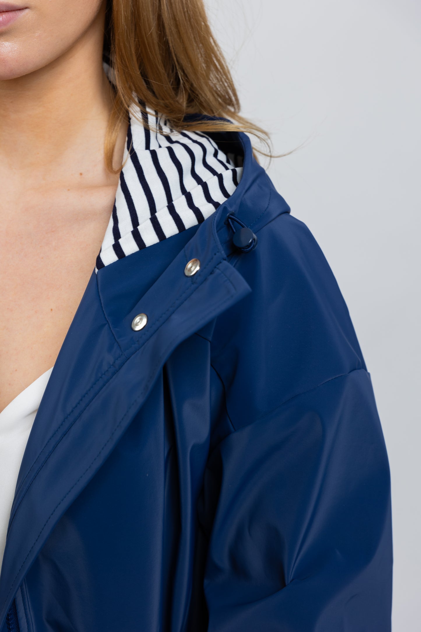 PARKA DE LLUVIA A RAYAS